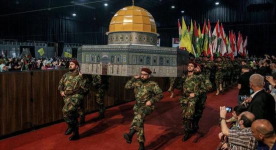 Combatientes de Hezbolá durante una manifestación masiva para conmemorar el Día Mundial de Al-Quds en Beirut, 29 de abril de 2022.